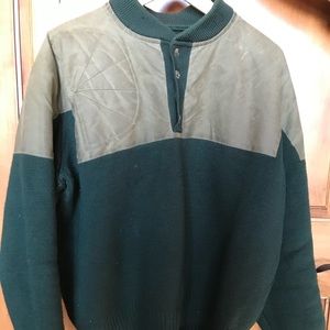 Filson Henley wool sweater with water-resistant reinforcement on yoke and arms